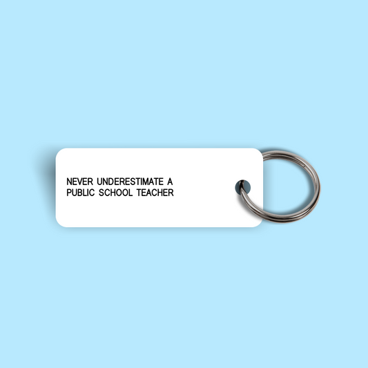 NEVER UNDERESTIMATE A PUBLIC SCHOOL TEACHER Keytag (2024-08-22)