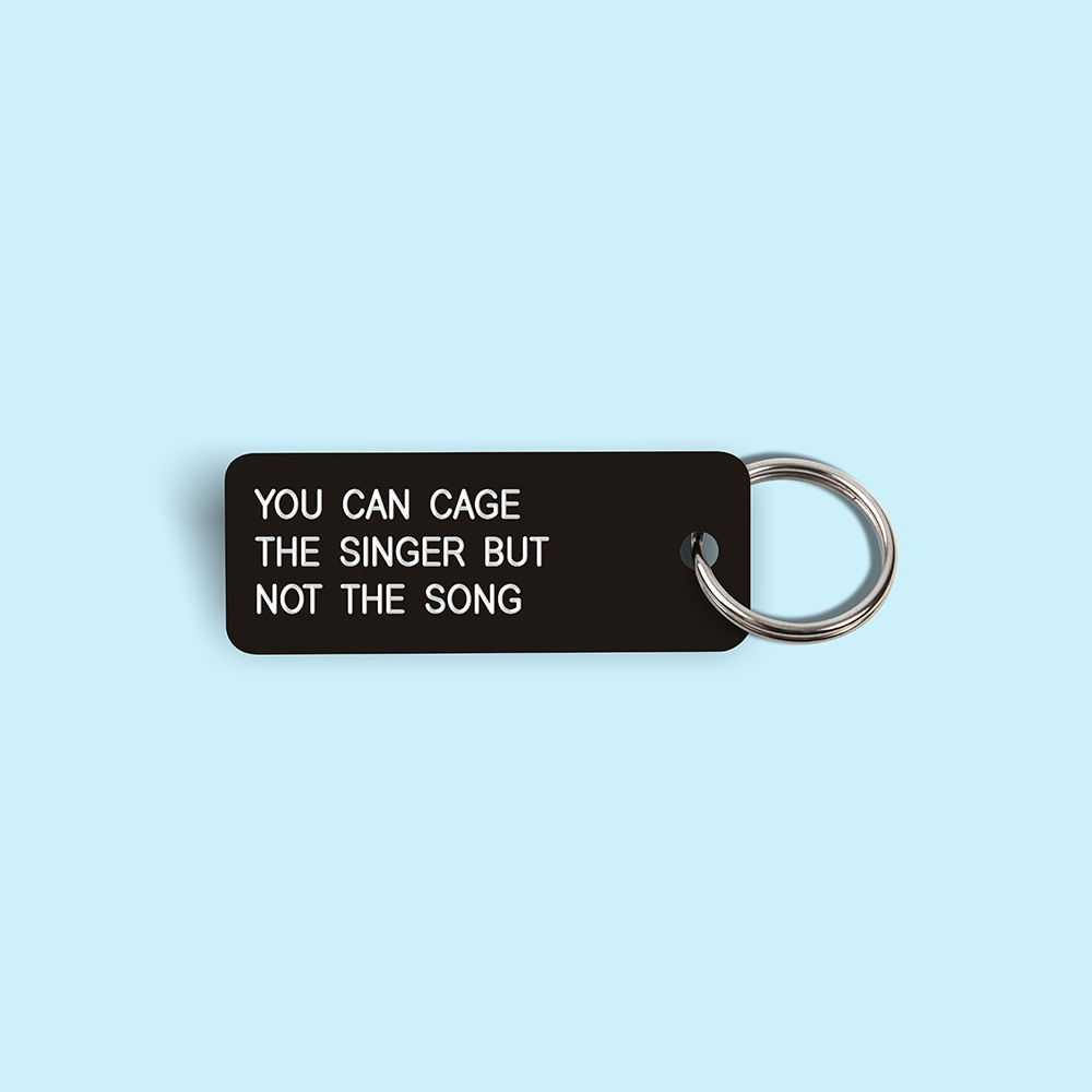 YOU CAN CAGE THE SINGER BUT NOT THE SONG Keytag (2023-04-25)