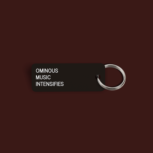 OMINOUS MUSIC INTENSIFIES Keytag (2022-12-02)