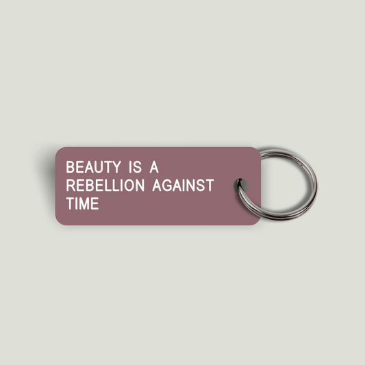 BEAUTY IS A REBELLION AGAINST TIME Keytag (2023-07-14)