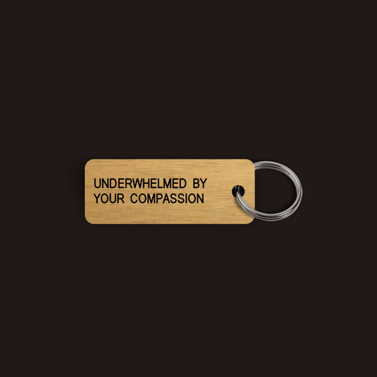 UNDERWHELMED BY YOUR COMPASSION Keytag (2025-02-06)