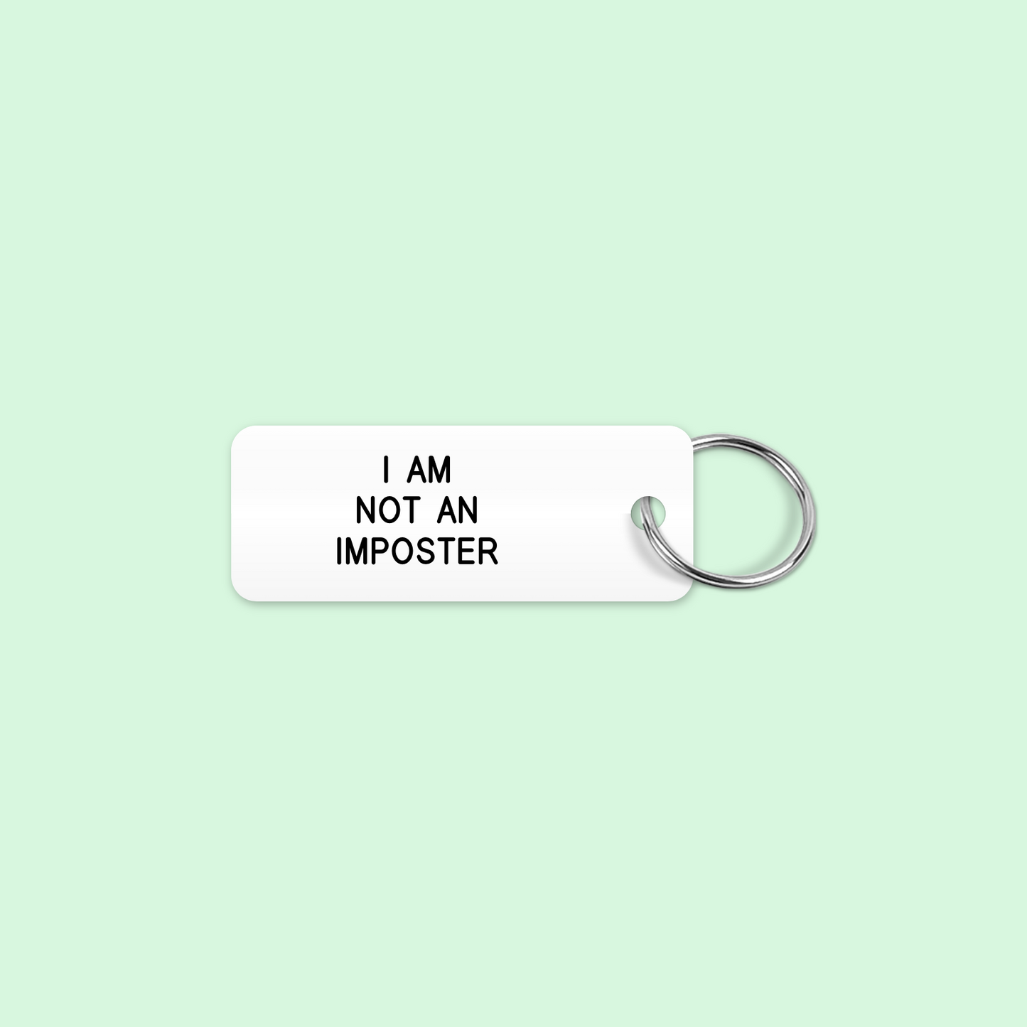 I AM
NOT AN
IMPOSTER keytag mockup