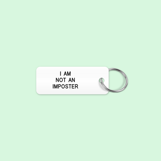 I AM
NOT AN
IMPOSTER keytag mockup