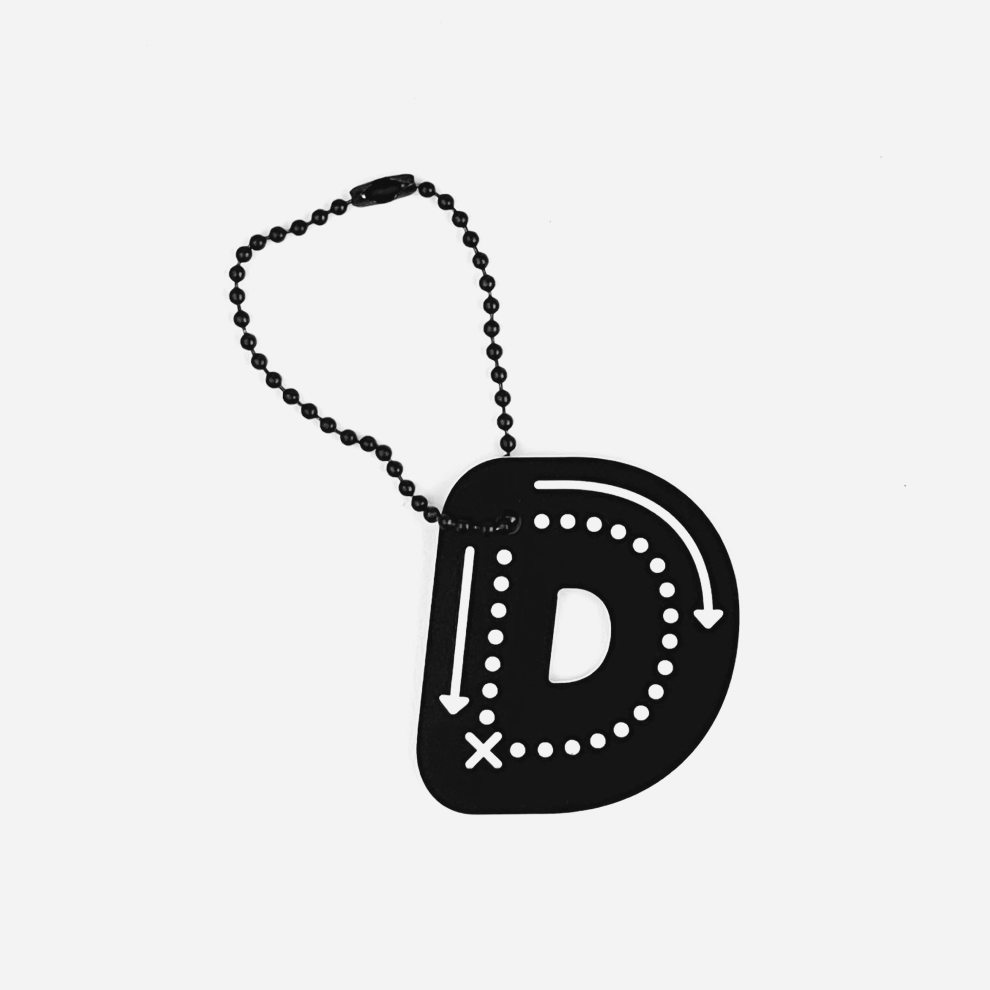 [Colophon] "D" Character Charm