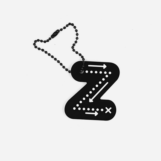 [Colophon] "Z" Character Charm